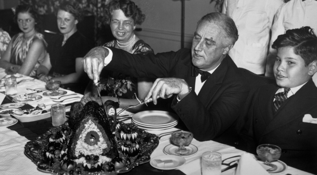 President Franklin Roosevelt having Thanksgiving dinner with the first family at the White House